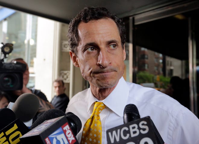 In this July 24, 2013, file photo, former Democratic U.S. Rep. Anthony Weiner leaves his apartment building in New York. Weiner appeared in federal court, Friday, May 19, 2017, and pleaded guilty criminal charges in an investigation of his online communications with a teenage girl in North Carolina. THE ASSOCIATED PRESS