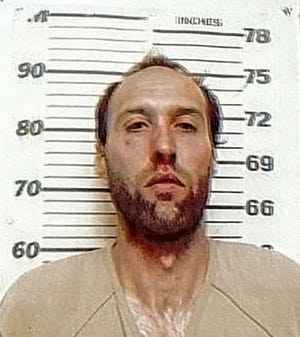 This undated photo provided by the Schuylkill County Prison in Pottsville, Pa., shows Cecil Kutz, charged with endangering the welfare of children and reckless endangerment. Police say Kutz locked his 22-month-old son in a makeshift wooden cage and left the boy home alone with his two younger siblings, including a sister born hours earlier, before his arrest Wednesday at the family's home in North Manheim Township, Pa. Schuylkill County Prison via AP
