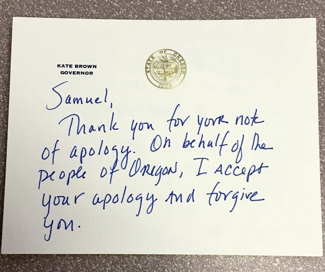 This photo provided by the Office of Oregon Gov. Kate Brown shows the Governor's response to an apology letter from a fourth-grader to her explaining that his class had toured the Capitol on a field trip in April 2017 and how he took a hazelnut and a pen from the Capitol Building. In a note replying to the letter, which included the pen in question and a $1 reimbursement for the hazelnut, Brown thanked the young man and wrote "I accept your apology and forgive you." THE ASSOCIATED PRESS
