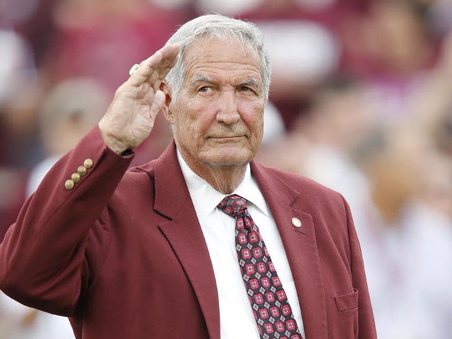 Former Alabama coach Gene Stallings salutes the crowd at Texas A&M on Sept. 14, 2013 at Kyle Field in College Station Texas College Station, Texas. Alabama beat Texas A&M by a score of 42-49.