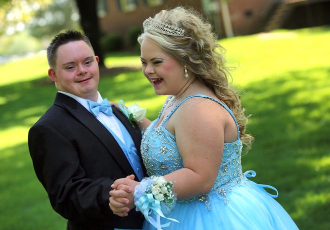 Jade Thomas, 18, is a senior at Crest High School. She met Chad Gunter, 17, at a dance for disabled youth in January. On Saturday, the couple attended Crest High School's prom. [Brittany Randolph/The Star]