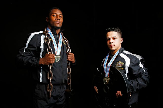 Boys weightlifters of the year, Columbia's Kamario Bell, left, and Andy Montalvo.