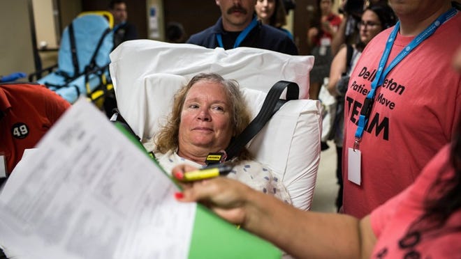 Lillian Mabee, a University Medical Center Brackenridge patient, speaks with a member of her care team as she is transferred from Brackenridge to the new Dell Seton Medical Center at UT on May 21, 2017. (TAMIR KALIFA/ AMERICAN-STATESMAN)