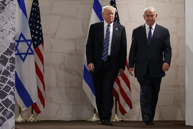 Israeli Prime Minister Benjamin Netanyahu and President Donald Trump arrive for a speech at the Israel Museum, Tuesday, May 23, 2017, in Jerusalem. THE ASSOCIATED PRESS