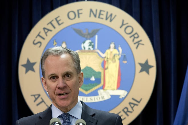 FILE - In this Feb. 11, 2016, file photo, New York Attorney General Eric T. Schneiderman speaks during a news conference in New York. On Tuesday, May 23, 2017, Schneiderman announced that 47 states and the District of Columbia have reached an $18.5 million settlement with Target Corp. to resolve the states' probe into the discounter's massive pre-Christmas data breach in 2013. THE ASSOCIATED PRESS