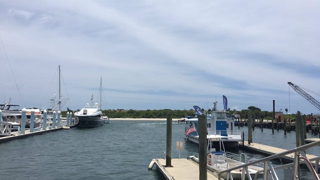One person is dead and two others are in the ER after diving incident at Riviera Beach Marina (Paige Fry / The Palm Beach Post)