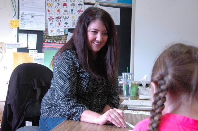 Parker Elementary School teacher Angela Lange works with a student recently. Photo contributed by the Iowa Department of Education