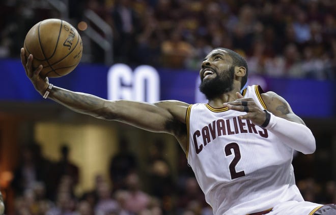 Cleveland's Kyrie Irving scored 42 points and added four assists in leading the Cavaliers to a 112-99 victory over Boston in Game 4 of the Eastern Conference finals. [Tony Dejak/The Associated Press]