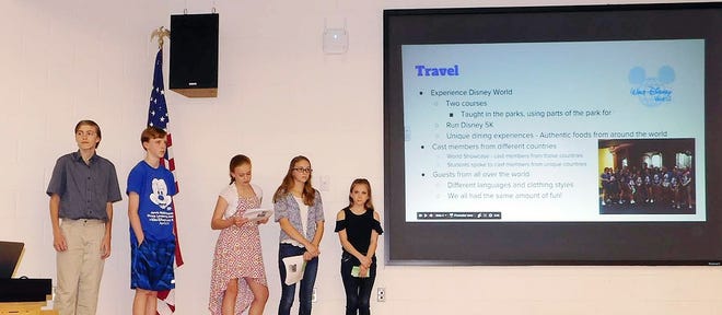 Jarvis Middle School students who attended the Disney Leadership Institute in Orlando, Florida, during their April school break share their experiences during Tuesday’s Central Valley school board meeting. [DONNA THOMPSON/TIMES TELEGRAM]
