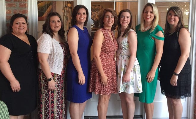 The members of the board attending the event are from left: Elizabeth Engolio, Tiffany Stein, Brittany Dupont, Audra Desselles, Nikki Lawhon, Kay Gaudin, and Nealey LeBlanc.