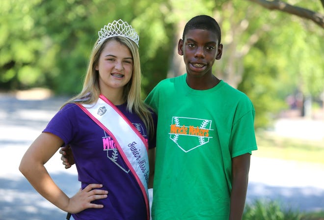 Brylee Powell, 13, created the Brylee's Miracle Makers baseball game in 2015 as a platform for Miss Shelby. The game is in honor of disabled people throughout the county. Powell's friend Javon Woodson, right, inspired her to start Miracle Makers. [Brittany Randolph/The Star]