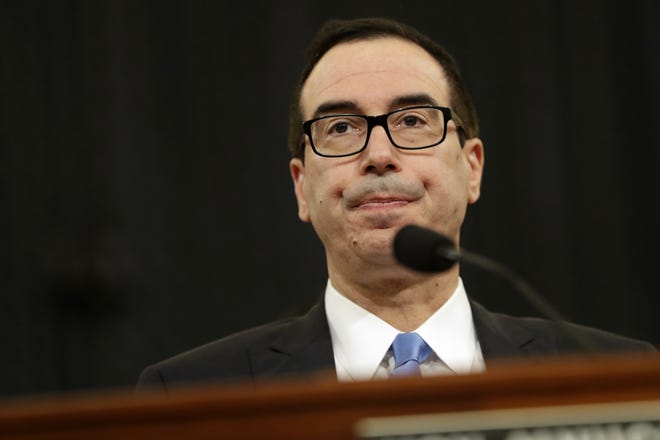 Treasury Secretary Steven Mnuchin testifies on Capitol Hill in Washington, Wednesday, May 24, 2017, before the House Ways and Means hearing on Treasury Department's fiscal 2018 budget proposals. THE ASSOCIATED PRESS
