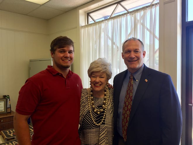 Clay Harris was presented with a scholarship from PRIDE last week. He's pictured with Sandra Baker and Hays Webb. [Contributed photo]