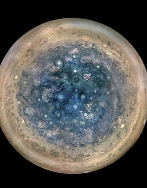 This image made available by NASA on Thursday, May 25, 2017, and made from data captured by the Juno spacecraft shows Jupiter's south pole. The oval features are cyclones, up to 600 miles in diameter. The cyclones are separate from Jupiter's trademark Great Red Spot, a raging hurricane-like storm south of the equator. The composite, enhanced color image was made from data on three separate orbits. NASA