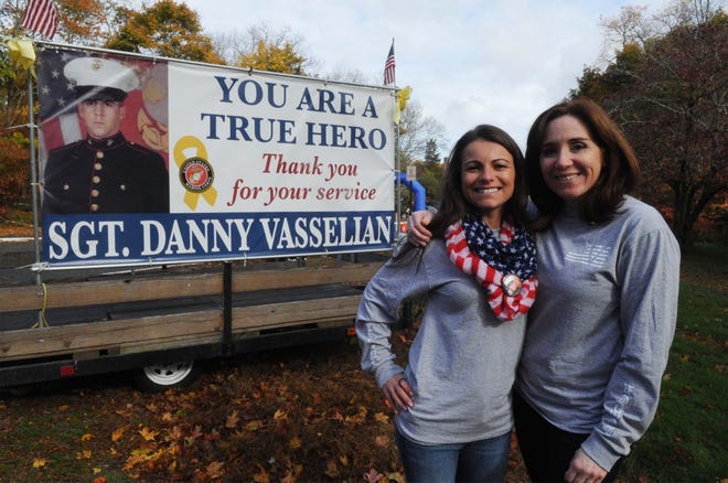 From left, race coordinator Jillian Crowley and race volunteer Mary Donohue during the 3rd annual Sergeant Daniel Vasselian 3.5 mile road race on Sunday, Nov. 6, 2016 in Abington. Approximately 1,000 runners participated with all monies raised going to the Daniel Vasselian Memorial Fund to help veterans. 

[Photo/Marc Vasconcellos/The Enterprise]