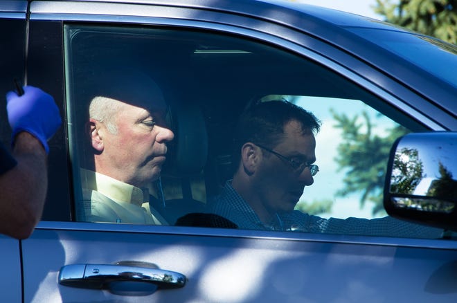 Republican candidate for Montana's only U.S. House seat, Greg Gianforte, sits in a vehicle near a Discovery Drive building Wednesday, May 24, 2017, in Bozeman, Mont. A reporter said Gianforte "body-slammed" him Wednesday, the day before the special election. THE ASSOCIATED PRESS