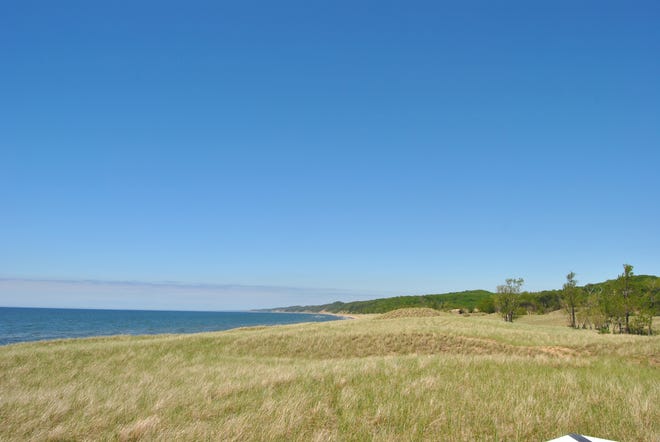 Land north of the McClendon home on the Padnos property is shown in Saugatuck Township. Home sites will be built further back from the McClendon home, which was built before changes in critical dune law. [Sydney Smith/Sentinel Photo]