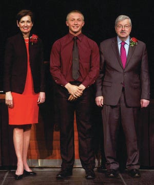 Blake Coughenour stands with Lt. Gov. Reynolds and Gov. Branstad. Contributed photo
