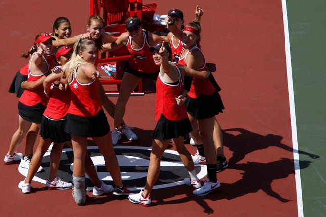 The Georgia women’s tennis team pumps up the crowd just before the start of a round of 16 NCAA tournament match between Georgia and Pepperdine at the Dan McGill Tennis complex in Athens, Ga., on Friday, May 19, 2017. Georgia lost 4-3. (Photo/Joshua L. Jones, Athens Banner-Herald)