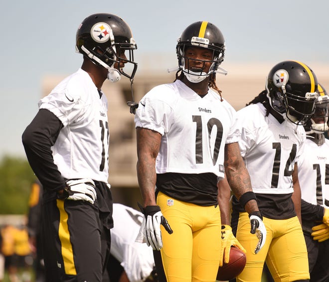 Wide receiver Martavis Bryant (10) talks with fellow wide receiver Justin Hunter (11) during organized team activities for the Pittsburgh Steelers on Tuesday at the UPMC Rooney Sports Complex.