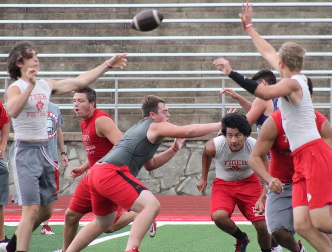 Members of the Glen Rose 7 on 7 football squad practice last Friday, the day before their first tournament. The Tigers will play this Saturday in a tournament in Brock.