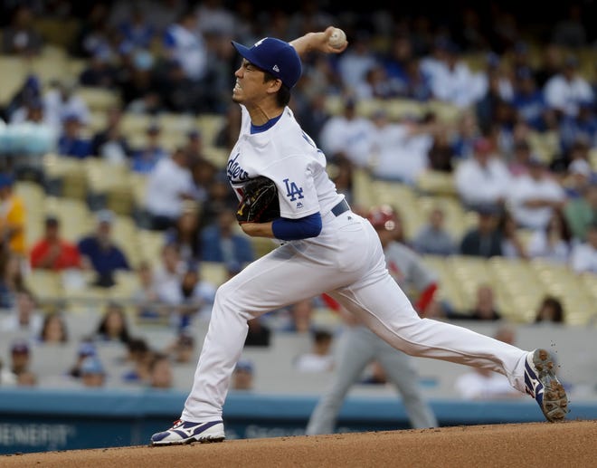 Los Angeles Dodgers starting pitcher Kenta Maeda, of Japan, throws against the St. Louis Cardinals during the first inning of a baseball game in Los Angeles, Thursday, May 25, 2017. (AP Photo/Chris Carlson)