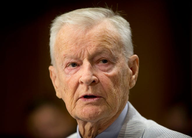 FILE - In this July 9, 2014 file photo, former National Security Adviser Zbigniew K. Brzezinski testifies on Capitol Hill in Washington, before the Senate Foreign Relations Committee hearing to examine Russia and developments in Ukraine. Brzezinski, the national security adviser to President Jimmy Carter, has died at age 89. His death was announced on social media Friday night, May 26, 2017, by his daughter, MSNBC host Mika Brzezinski. (AP Photo/Pablo Martinez Monsivais, File)