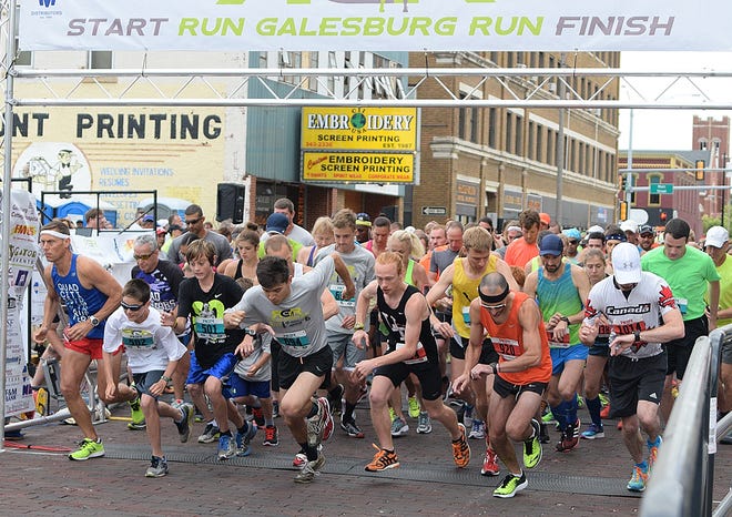 Runners take their first steps during the 2016 Run Galesburg Run on Kellogg Street in Galesburg. This year's race will be held June 4. BILL NICE/The Register-Mail