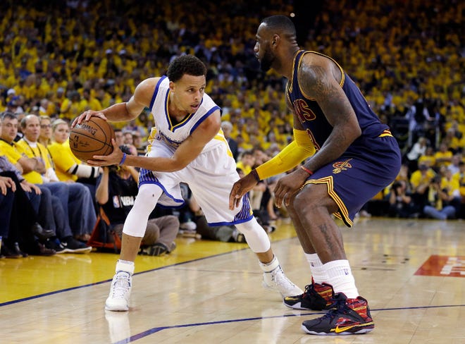 Steph Curry, left, and LeBron James will be facing off again for the NBA championship.