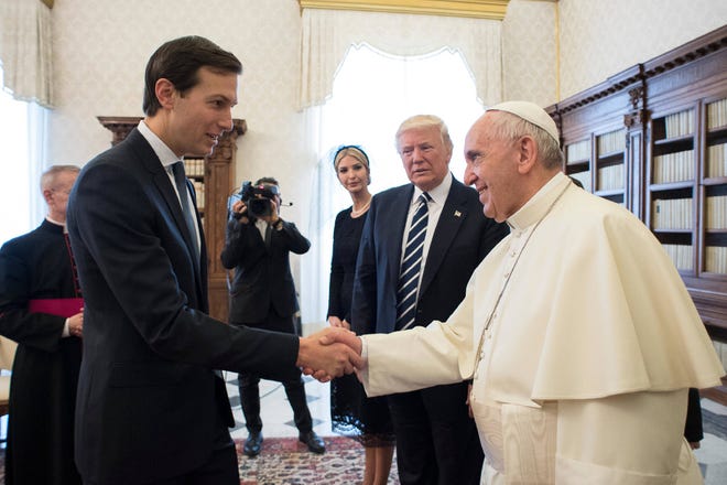 Jared Kushner, senior advisor of President Donald Trump, shakes hands with Pope Francis, at the Vatican, Wednesday, May 24, 2017. (L’Osservatore Romano/Pool Photo via AP)