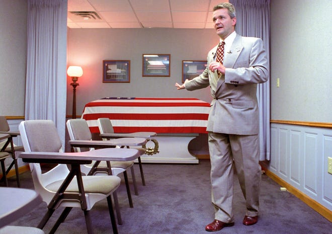 William Zwicharowski, mortuary branch chief at Dover Air Force Base in Delaware, talks with the press during a tour of the mortuary in 2003. [JUANA ARIAS/WASHINGTON POST FILE PHOTO]