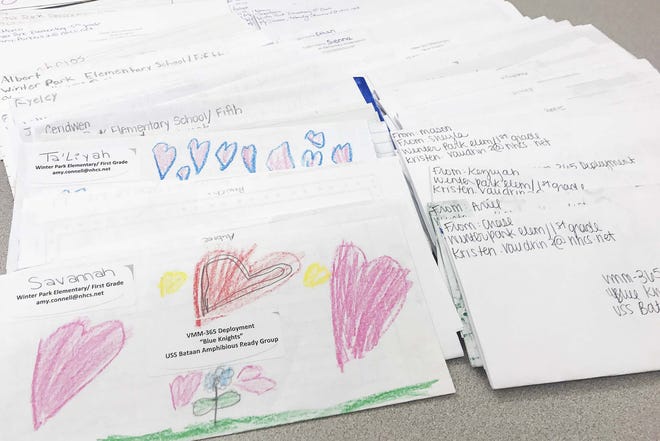 These are letters that Winter Park Elementary students wrote to deployed service men and women as a part of the þÄúLetters from HomeþÄù project sponsored by the Wilmington WomanþÄôs Club. [Terah Wilson/StarNews]