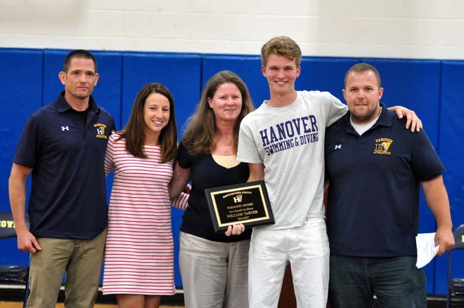 Hanover senior Will DeBoer was honored with the Paragon Award for Overall Excellence, including athletic performance, academics, leadership and character. Along with DeBoer are track coach Tim Brown, assistant swim coach Nikki Pugatcha, swim coach Barb Toohey and boys track coach Pete Harrison [Wicked Local Photo/William Wassersug]