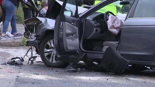 A Medford Police officer was taken to the hospital with non life-threatening injuries after a vehicle crashed into the front drivers side of his police cruiser Monday. [WCVB photo]