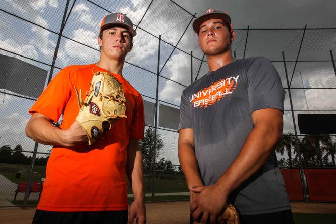 University High pitcher Logan Allen, left, and catcher Jacob Molle have been batterymates as varsity stalwarts for three seasons. The pair will lead the Titans into a Class 9A state baseball semifinal Friday against Miami Pametto. [News-Journal/LOLA GOMEZ]