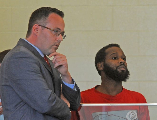 Avery Howard, right, at his arraigment with his Attorney Scott Bradley at Taunton District Court on Tuesday morning, May 30.