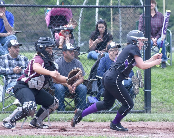 Caitlin Grace follows through on her swing for Little Falls Saturday at Frankfort-Schuyler. Grace had three hits in the Mounties' quarterfinal win. Also pictured is Frankfort-Schuyler catcher Michaela Costello.      

[Jon Rathbun / Times Telegram]