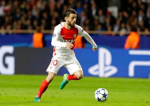 FILE - In this Wednesday, May 3, 2017 file photo, Monaco's Bernardo Silva goes for the ball during the Champions League semifinal first leg soccer match between Monaco and Juventus at the Louis II stadium in Monaco. Manchester City boosted its attacking options by signing Monaco playmaker Bernardo Silva on Friday, May 26, 2017.