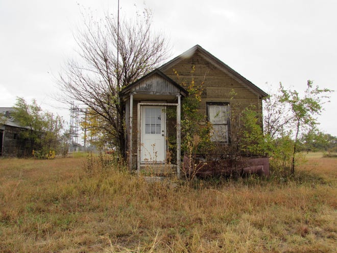 One of just a few homes still standing in South Hoisington, Kansas. The railroad tracks divided Hoisington from segregated Hoisington. After most people left, the state cleaned up South Hoisington, as it became an illegal dump site.