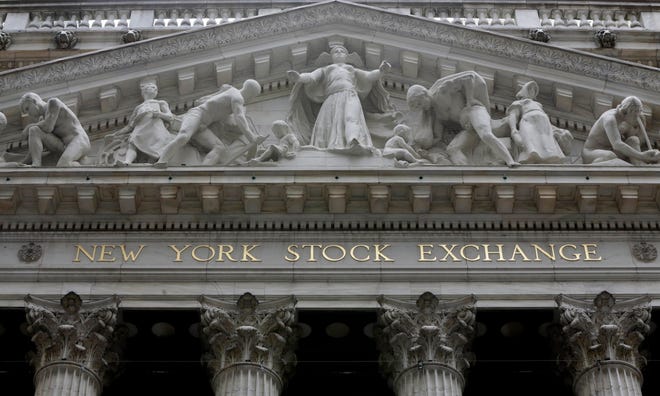 This Thursday, Oct. 2, 2014, file photo, shows the facade of the New York Stock Exchange. U.S. stocks are lower early Tuesday, May 30, 2017, as energy companies once again slump with the price of oil and banks slide in tandem with bond yields and interest rates. THE ASSOCIATED PRESS