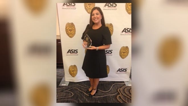 Christine Cunningham was named supervisor of the year by ASIS International at the annual Law Enforcement Officers Awards luncheon last week. She dedicated the award to her dad, retired Palm Beach Sgt. Wayne Stevens.