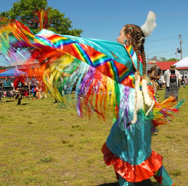 Alyssa Budd, 10, of Marshfield, performs tribal dances at the 24th annual Spring Planting Moon Pow-Wow and Native American Arts & Crafts Festival at Marshfield Fairgrounds Saturday, May 27.

[Photo/Gary Higgins/The Patriot Ledger]
