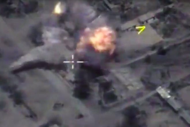 In this frame grab provided on Wednesday, May 31, 2017 by Russian Defense Ministry press service, IS target is hit by long-range Kalibr cruise missile in the area of Palmyra, Syria. The Russian Defense Ministry said in a statement on Wednesday, that the Admiral Essen frigate and the Krasnodar submarine in the Mediterranean Sea launched the missiles at IS targets in the area of the ancient city of Palmyra. RUSSIAN DEFENSE MINISTRY PHOTO SERVICE/AP