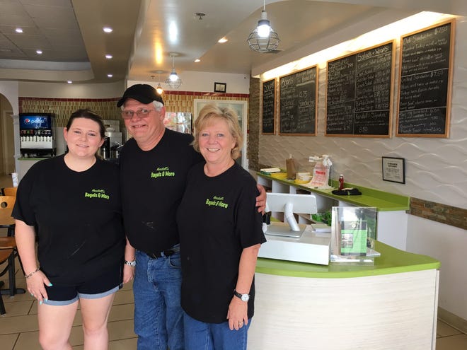 From left, Lindsay Brzozowski, manager at Kendall's Bagels & More, with her parents and store owners Kendall Williams and Kim Williams. [News-Tribune/Aaron London]