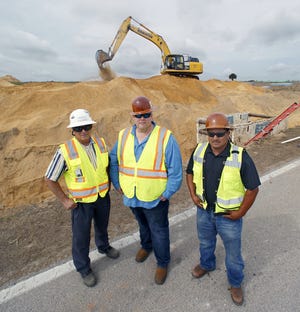 Tucker Paving recently surpassed 1 million work hours without lost time from injury. From left are Safety Director Terry Tucker, Executive Vice President Patrick Braisted and pipe superintendent Jose Lopez.  [ PIERRE DUCHARME/THE LEDGER ]