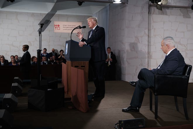 Israeli Prime Minister Benjamin Netanyahu listens as President Donald Trump speaks at the Israel Museum, Tuesday, May 23, 2017, in Jerusalem. Trump temporarily has waived the law requiring the U.S. embassy be located in Jerusalem.