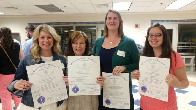 Faculty from the Early Childhood Center, Lori Potvin, Pam Bakerlis, Carolyn Beaumier and Kayla Brank.