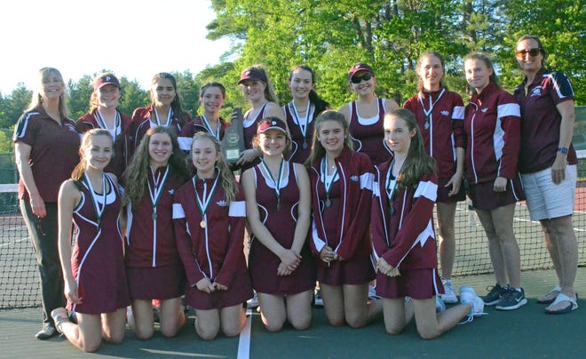 The Portsmouth High School girls tennis team poses with the runner-up plaque after losing Friday's Division II championship match, 5-4, to Windham at Bedford High School. The top-seeded Clippers finished 16-1.