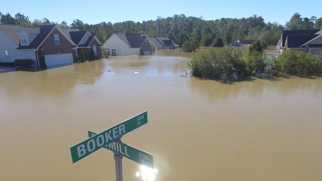 A drone photo taken in the Hope Mills neighborhood of Brookridge by Quavas Hart on the morning of Oct. 8 showing the flood devastation following Hurricane Matthew.