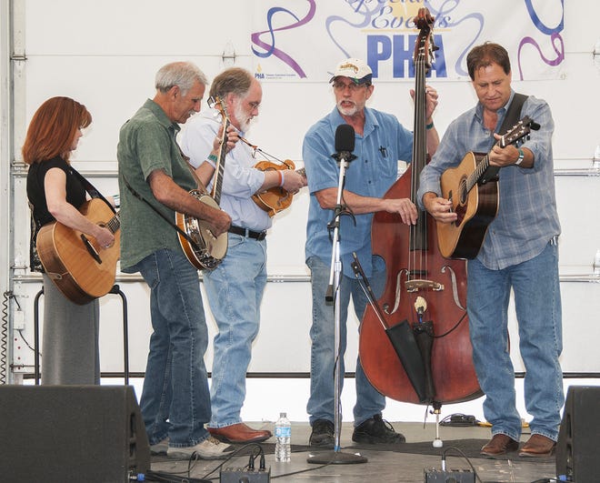 FILE PHOTO Pueblo band Fireweed picks out a tune at the Bluegrass at the Fair festival.